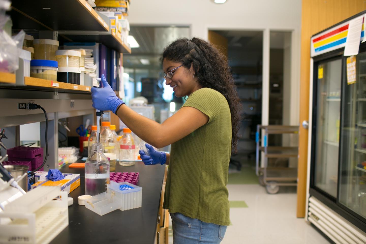 Student conducting science experiment in lab